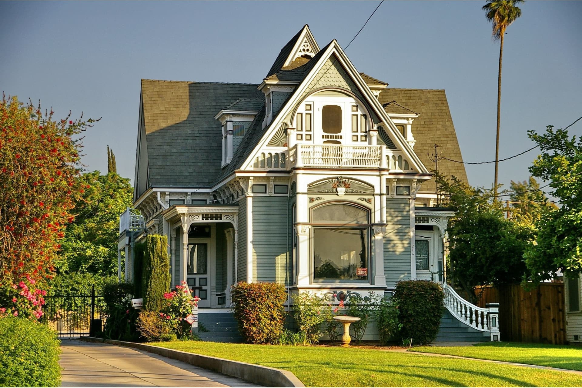 A older house with a beautiful modern landscaped front yard